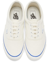 Baskets basses en toile blanches Vans