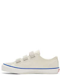 Baskets basses en toile blanches Vans