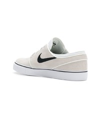 Baskets basses en toile blanches Nike