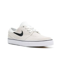 Baskets basses en toile blanches Nike