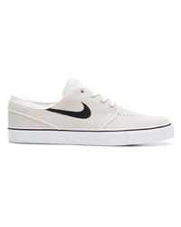 Baskets basses en toile blanches Nike