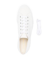 Baskets basses en toile blanches Common Projects