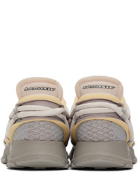 Baskets basses en toile blanches Lacoste