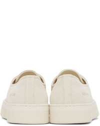 Baskets basses en toile blanches Common Projects