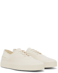 Baskets basses en toile blanches Common Projects