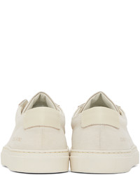 Baskets basses en toile blanches Common Projects