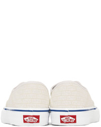 Baskets basses en toile blanches Vans