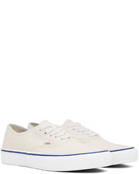 Baskets basses en toile blanches Vans