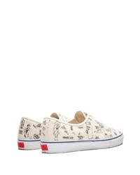 Baskets basses en toile blanches Vans