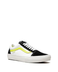 Baskets basses en toile blanches Vans