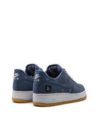 Baskets basses en toile bleu marine Nike