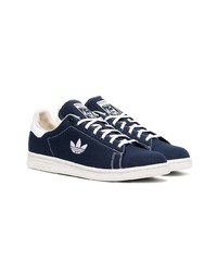 Baskets basses en toile bleu marine adidas