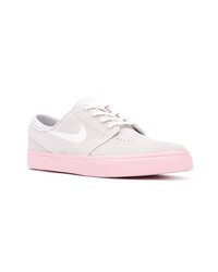 Baskets basses en toile grises Nike