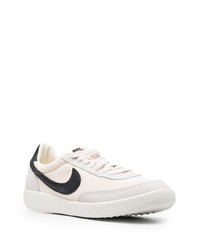 Baskets basses en toile imprimées beiges Nike