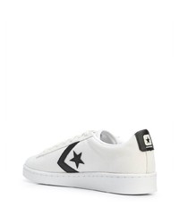 Baskets basses en toile imprimées blanches et noires Converse