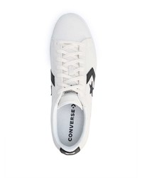 Baskets basses en toile imprimées blanches et noires Converse