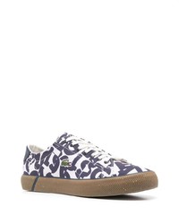 Baskets basses en toile imprimées blanches Lacoste