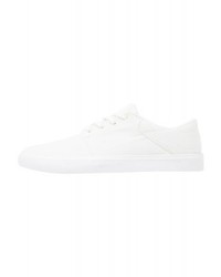 Baskets basses en toile imprimées blanches Nike