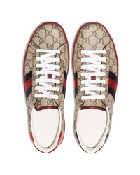 Baskets basses en toile imprimées marron clair Gucci