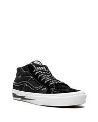 Baskets basses en toile imprimées noires Vans