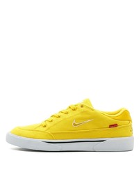 Baskets basses en toile jaunes Nike