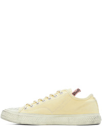 Baskets basses en toile jaunes Acne Studios