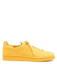 Baskets basses en toile moutarde Adidas By Pharrell Williams