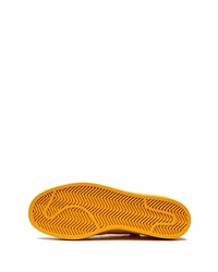 Baskets basses en toile moutarde adidas
