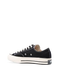 Baskets basses en toile noires et blanches Converse