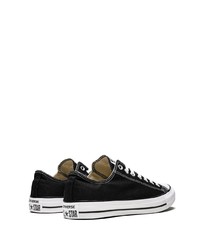 Baskets basses en toile noires et blanches Converse