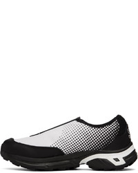 Baskets basses en toile noires et blanches Comme Des Garcons Homme Plus