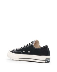 Baskets basses en toile noires et blanches Converse