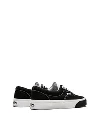 Baskets basses en toile noires et blanches Vans