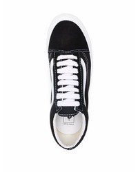 Baskets basses en toile noires et blanches Vans