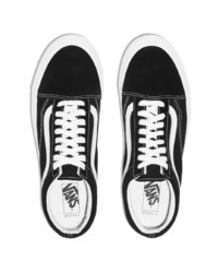 Baskets basses en toile noires et blanches Vans