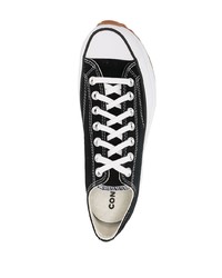 Baskets basses en toile noires et blanches Converse