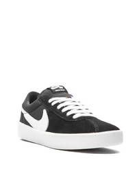 Baskets basses en toile noires et blanches Nike