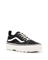 Baskets basses en toile noires et blanches Vans