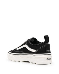 Baskets basses en toile noires et blanches Vans