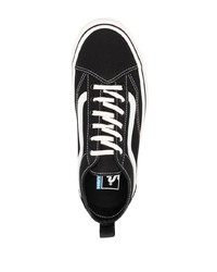 Baskets basses en toile noires et blanches Vans