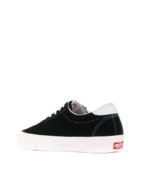 Baskets basses en toile noires et blanches Vans