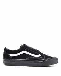 Baskets basses en toile noires et blanches Vans