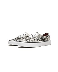 Baskets basses en toile noires et blanches Vans