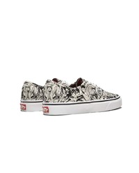 Baskets basses en toile noires et blanches Vans