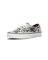 Baskets basses en toile noires et blanches Vans