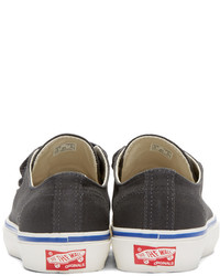 Baskets basses en toile noires Vans