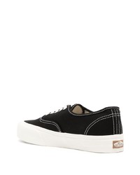 Baskets basses en toile noires Vans