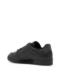 Baskets basses en toile noires adidas