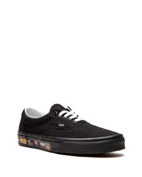 Baskets basses en toile noires Vans