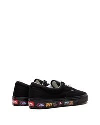 Baskets basses en toile noires Vans